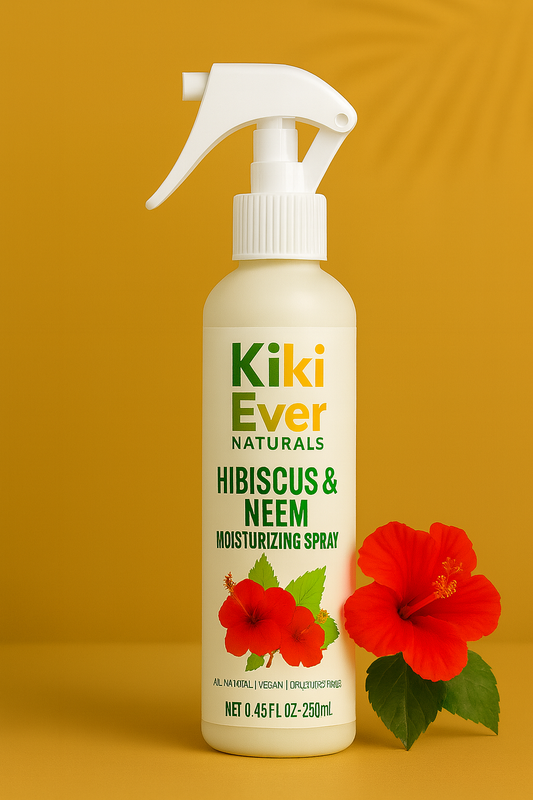 Kiki Ever Naturals Hibiscus & Neem moisturizing spray bottle on a yellow background with red flowers.