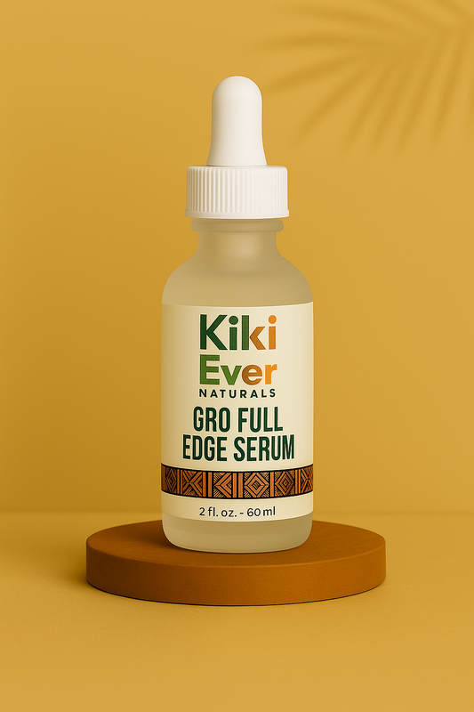 Kiki Ever Naturals Gro Full Edge Serum bottle on a brown platform with a yellow background