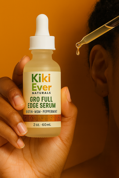 Kiki Ever Naturals Gro Full Edge Serum bottle with dropper being used on hair.