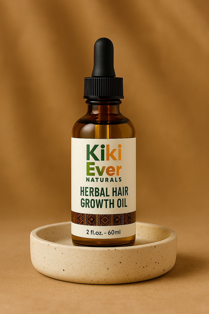 Kiki Ever Naturals herbal hair growth oil bottle on a beige dish with a brown background
