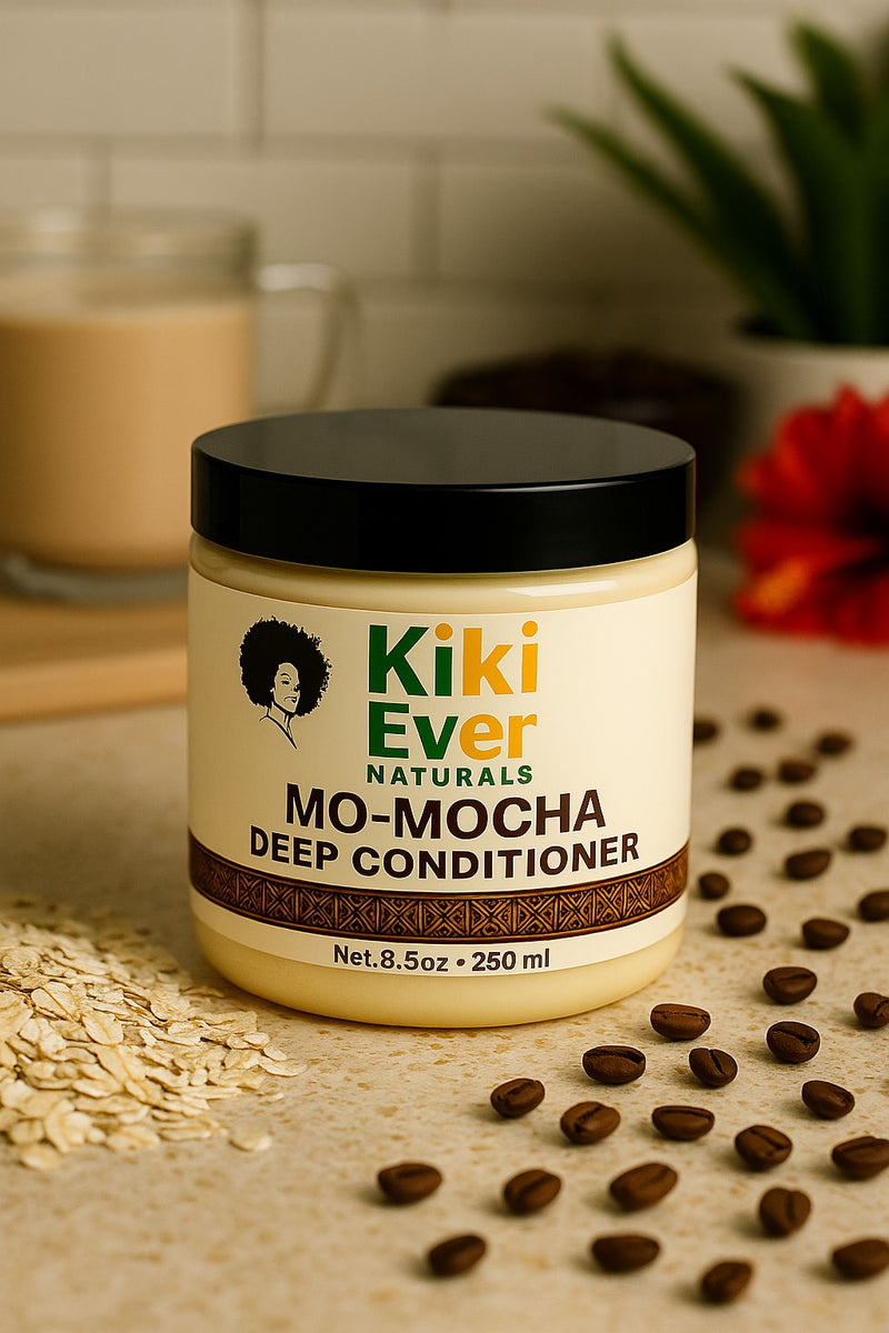 Kiki Ever Naturals Mo-Mocha Deep Conditioner jar with coffee beans and oats on a neutral background