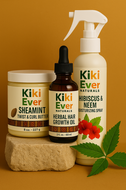 Kiki Ever Naturals hair care products including a spray bottle, oil, and butter on a brown background.