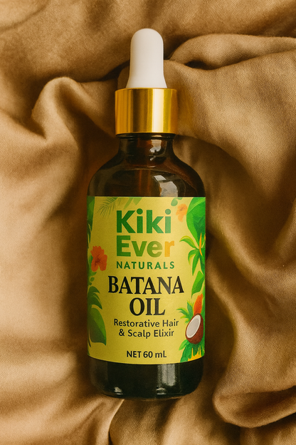 Kiki Ever Naturals Batana Oil bottle on a brown fabric background
