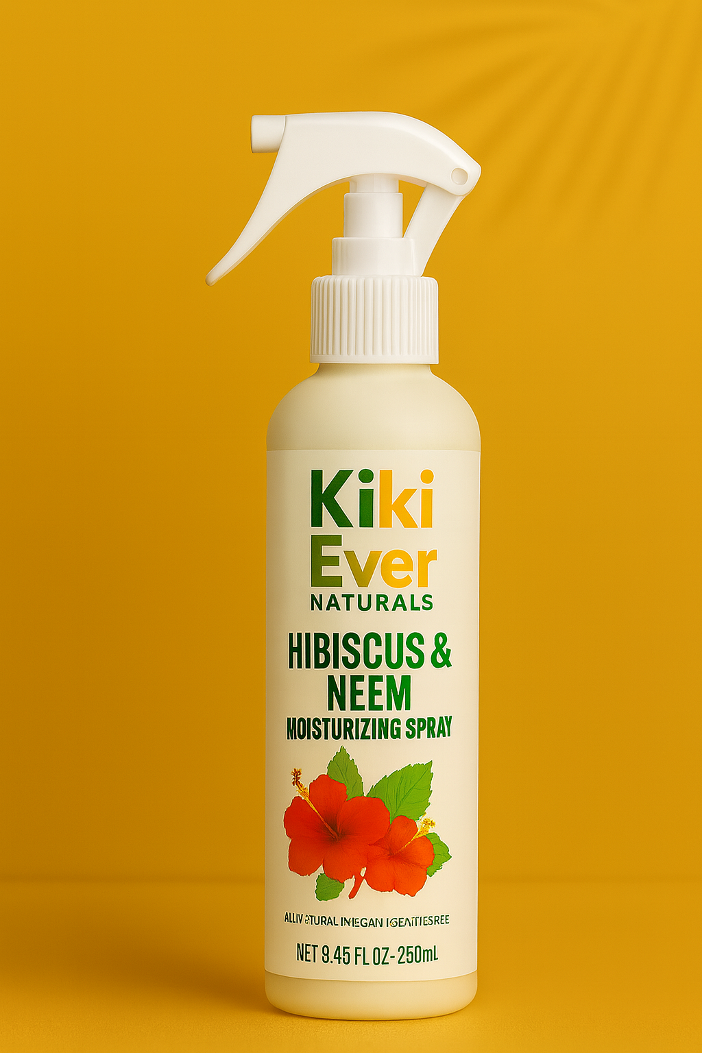 Kiki Ever Naturals Hibiscus & Neem moisturizing spray bottle on a yellow background