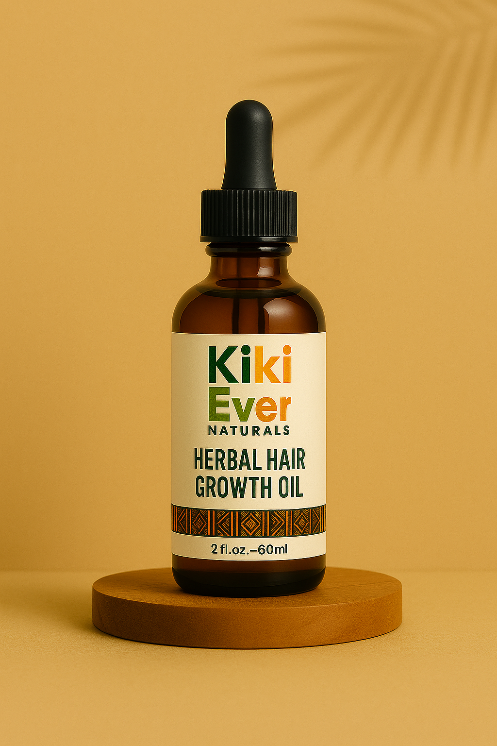 Kiki Ever Naturals Herbal Hair Growth Oil bottle on a wooden platform with a beige background
