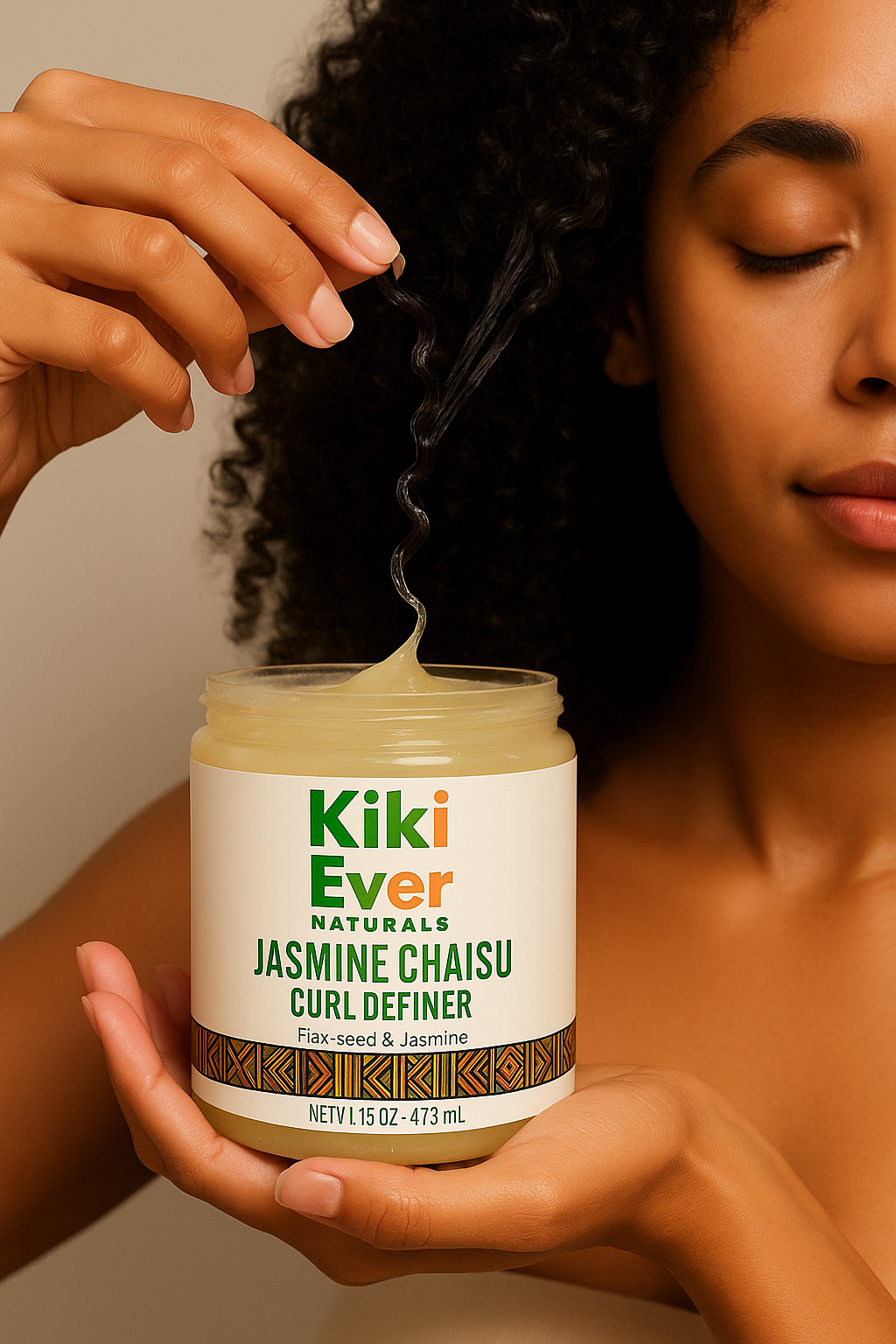 Person using Kiki Ever Naturals Jasmine Chaisu Curl Definer on their hair.