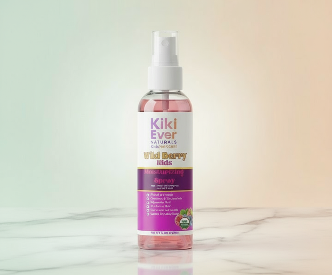 Kiki Ever Naturals Wild Berry Kids moisturizing spray bottle on a light background